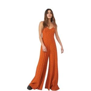 Free People Jamboree Jumpsuit in Orange and Black Polka Dot Size XS